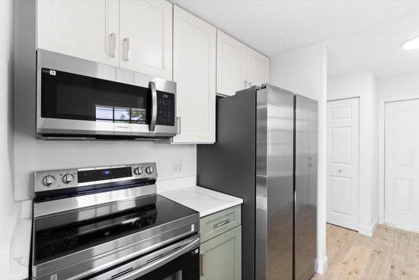 Interior, Kitchen, Recessed Lighting, Stainless Steel Appliances, Wood Texture Flooring