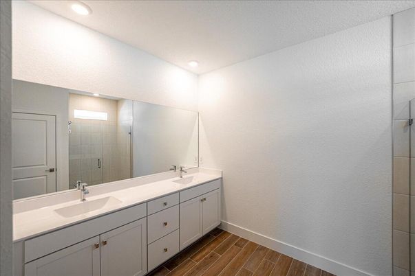 Bathroom, Dual Sink Vanities, Interior, Recessed Lighting, Wood Texture Flooring