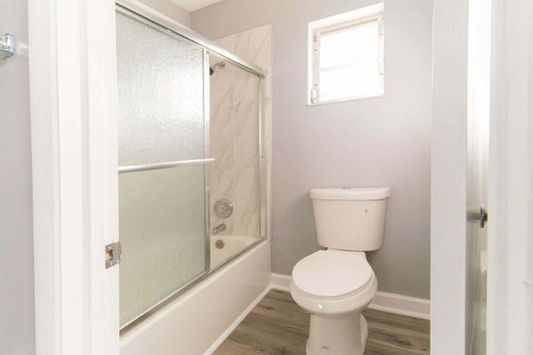 Bathroom, Glass Shower, Interior, Marble Walls, Wood Texture Flooring