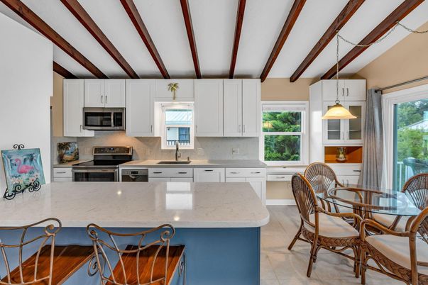 Dining room, Interior, Kitchen, Pendant Lights, Stainless Steel Appliances, Wooden Beams