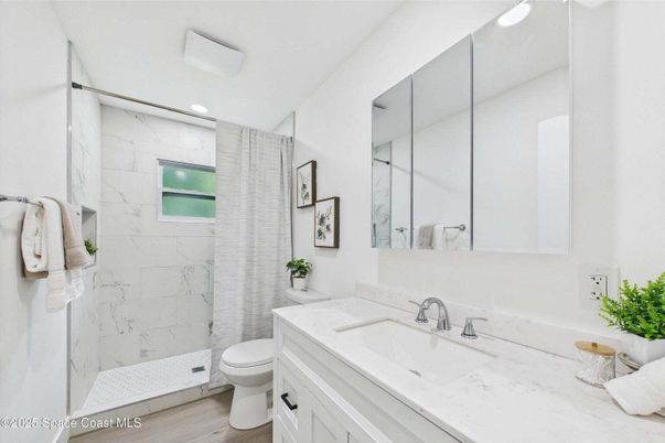 Bathroom, Glass Shower, Interior, Marble Walls, Recessed Lighting, Wood Texture Flooring