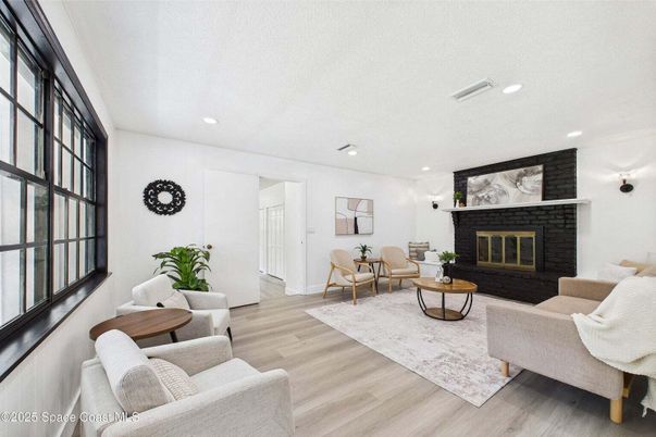 Fireplace, Interior, Living room, Recessed Lighting, Wood Texture Flooring