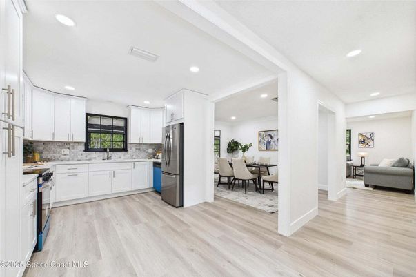 Dining room, Interior, Kitchen, Recessed Lighting, Stainless Steel Appliances, Wood Texture Flooring