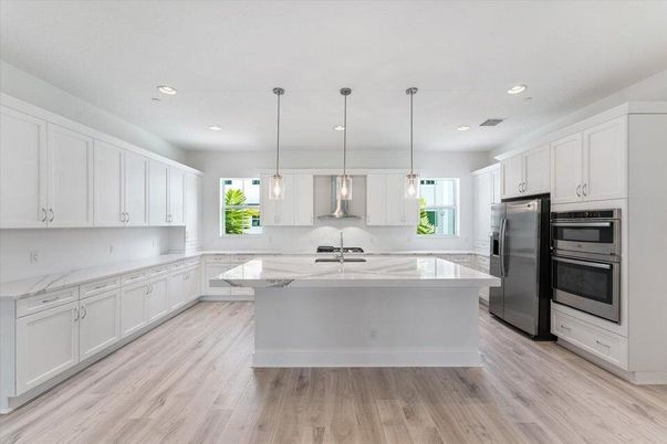 Interior, Kitchen, Pendant Lights, Recessed Lighting, Stainless Steel Appliances, Wood Texture Flooring