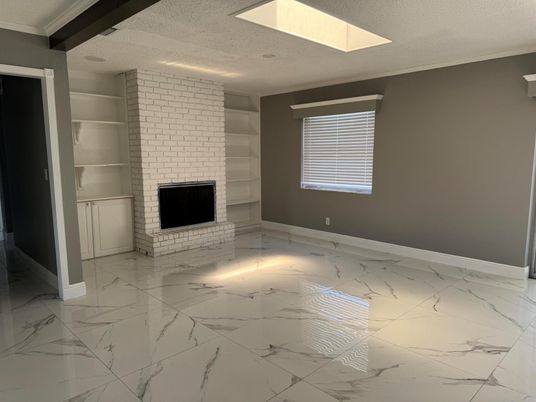 Empty room, Fireplace, Interior, Marble, Recessed Lighting, Stone Walls