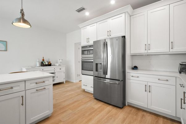 Interior, Kitchen, Pendant Lights, Recessed Lighting, Stainless Steel Appliances, Wood Texture Flooring
