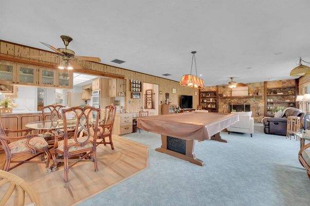 Billiard Table, Dining room, Fireplace, Game Room, Interior, Pendant Lights, Stone Walls