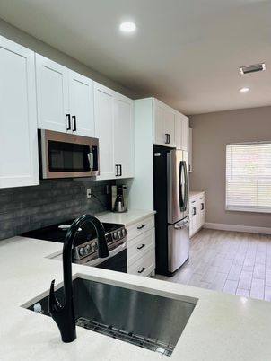 Interior, Kitchen, Recessed Lighting, Washer, Wood Texture Flooring