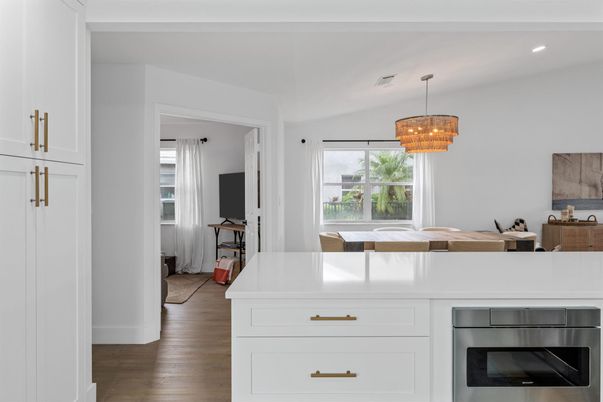 Chandelier, Interior, Kitchen, Recessed Lighting, Stainless Steel Appliances, Wood Texture Flooring