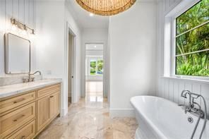 Bathroom, Chandelier, Dual Sink Vanities, Free Standing Baths, Interior, Marble, Recessed Lighting