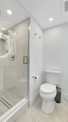 Bathroom, Glass Shower, Interior, Recessed Lighting, Wood Texture Flooring