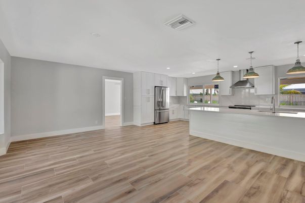 Interior, Kitchen, Pendant Lights, Recessed Lighting, Stainless Steel Appliances, Wood Texture Flooring