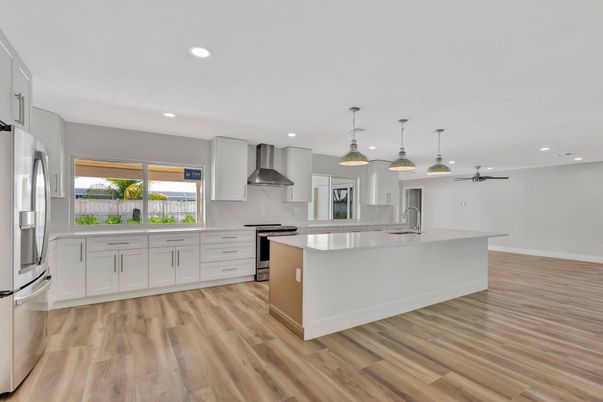Interior, Kitchen, Pendant Lights, Recessed Lighting, Stainless Steel Appliances, Wood Texture Flooring