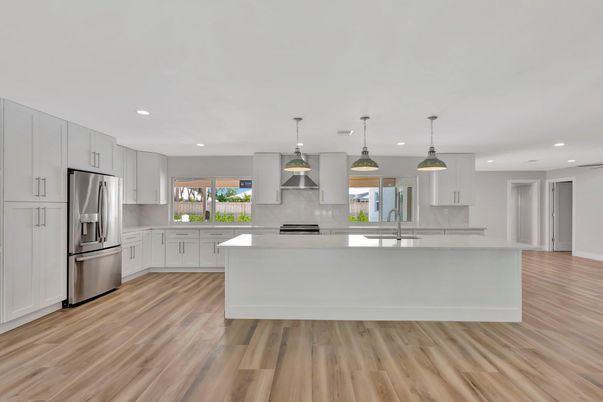 Interior, Kitchen, Pendant Lights, Recessed Lighting, Stainless Steel Appliances, Wood Texture Flooring