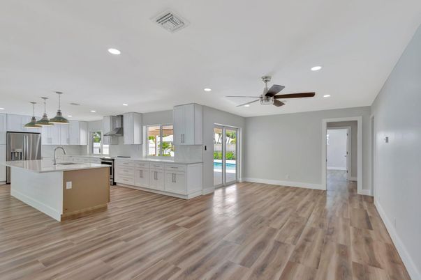 Interior, Kitchen, Pendant Lights, Recessed Lighting, Stainless Steel Appliances, Wood Texture Flooring
