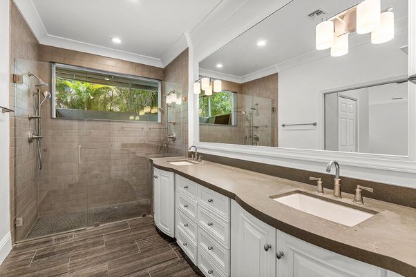 Bathroom, Dual Sink Vanities, Glass Shower, Interior, Recessed Lighting, Wood Texture Flooring