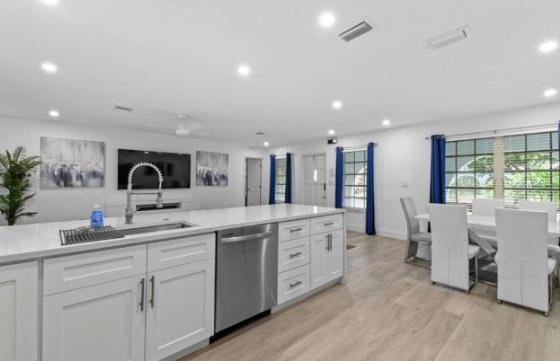 Dining room, Interior, Kitchen, Recessed Lighting, Stainless Steel Appliances, Wood Texture Flooring
