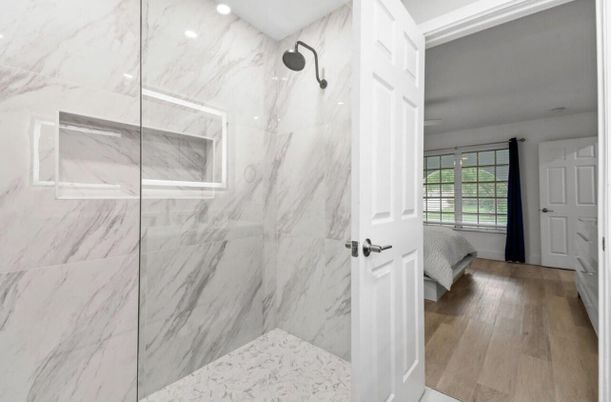 Bathroom, Glass Shower, Interior, Marble Walls, Recessed Lighting, Wood Texture Flooring