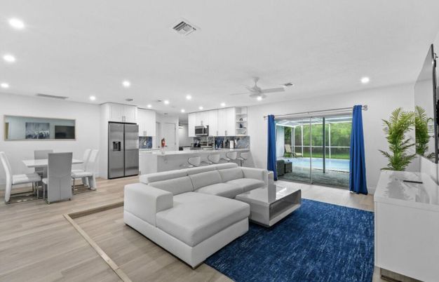 Dining room, Interior, Kitchen, Living room, Recessed Lighting, Stainless Steel Appliances, Wood Texture Flooring