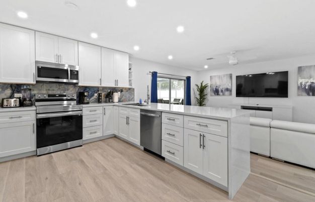 Interior, Kitchen, Recessed Lighting, Stainless Steel Appliances, Wood Texture Flooring
