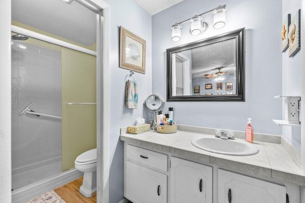 Bathroom, Glass Shower, Interior, Tile Countertops, Wood Texture Flooring