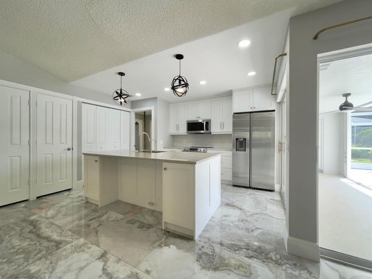 Interior, Kitchen, Marble, Pendant Lights, Recessed Lighting, Stainless Steel Appliances