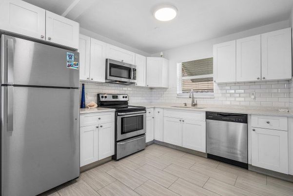 Interior, Kitchen, Recessed Lighting, Stainless Steel Appliances, Wood Texture Flooring