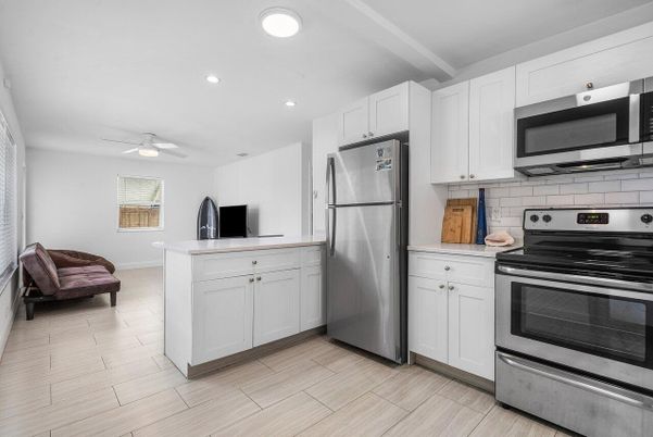 Interior, Kitchen, Recessed Lighting, Stainless Steel Appliances, Wood Texture Flooring