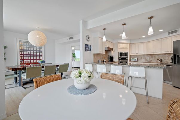 Dining room, Interior, Kitchen, Pendant Lights, Recessed Lighting, Stainless Steel Appliances, Wood Texture Flooring