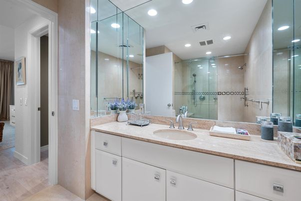 Bathroom, Dual Sink Vanities, Glass Shower, Interior, Recessed Lighting, Wood Texture Flooring