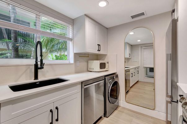 Interior, Kitchen, Recessed Lighting, Washer, Wood Texture Flooring