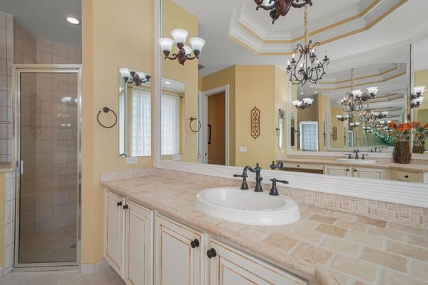 Bathroom, Chandelier, Glass Shower, Interior, Recessed Lighting, Tile Countertops