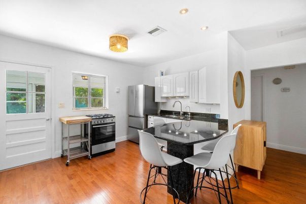 Dining room, Interior, Kitchen, Recessed Lighting, Stainless Steel Appliances, Wood Texture Flooring