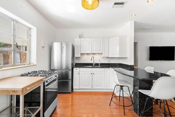 Dining room, Interior, Kitchen, Recessed Lighting, Stainless Steel Appliances, Wood Texture Flooring