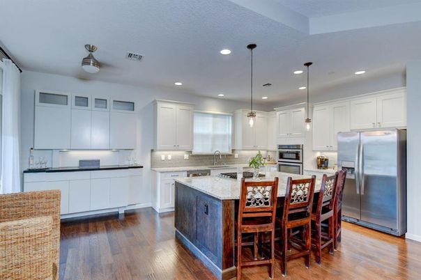 Dining room, Interior, Kitchen, Pendant Lights, Recessed Lighting, Stainless Steel Appliances, Wood Texture Flooring