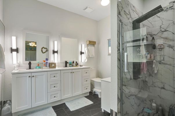 Bathroom, Dual Sink Vanities, Glass Shower, Interior, Marble, Marble Walls