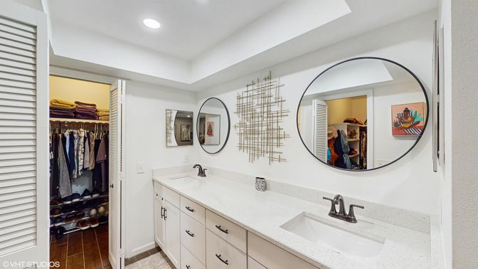 Bathroom, Dual Sink Vanities, Interior, Recessed Lighting, Walk-in Closets, Wood Texture Flooring