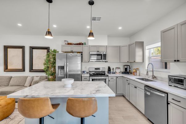 Interior, Kitchen, Pendant Lights, Recessed Lighting, Stainless Steel Appliances, Wood Texture Flooring