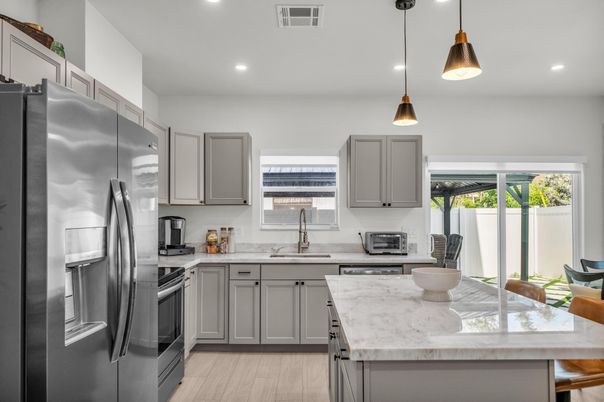 Interior, Kitchen, Pendant Lights, Recessed Lighting, Stainless Steel Appliances, Wood Texture Flooring