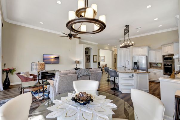Chandelier, Dining room, Interior, Kitchen, Living room, Pendant Lights, Recessed Lighting, Stainless Steel Appliances, Wood Texture Flooring