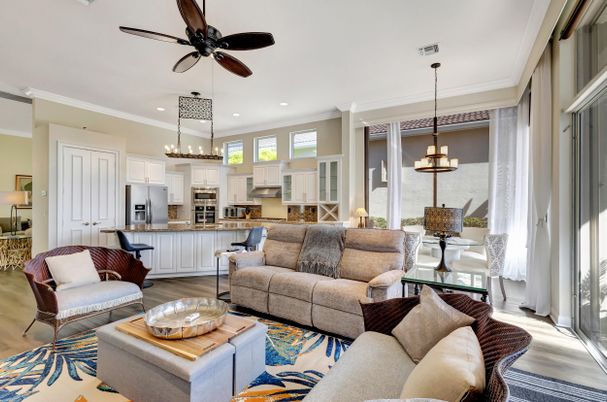 Chandelier, Dining room, Interior, Kitchen, Living room, Pendant Lights, Recessed Lighting, Stainless Steel Appliances, Wood Texture Flooring