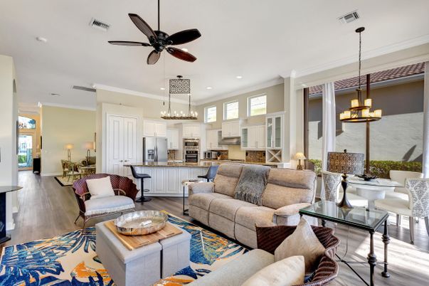 Chandelier, Dining room, Interior, Kitchen, Living room, Pendant Lights, Recessed Lighting, Stainless Steel Appliances, Wood Texture Flooring