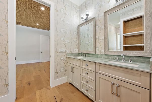Bathroom, Dual Sink Vanities, Interior, Marble Walls, Recessed Lighting, Wood Texture Flooring