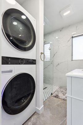 Bathroom, Glass Shower, Interior, Marble Walls, Recessed Lighting, Washer