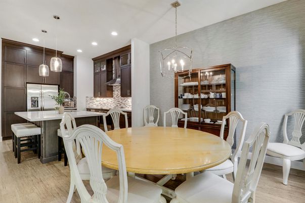 Dining room, Interior, Kitchen, Pendant Lights, Recessed Lighting, Stainless Steel Appliances, Wood Texture Flooring