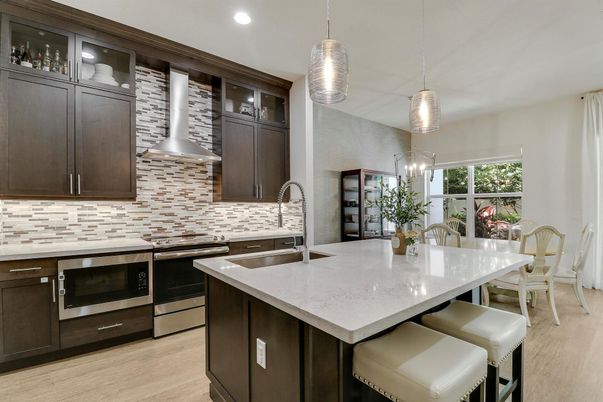 Dining room, Interior, Kitchen, Pendant Lights, Recessed Lighting, Stainless Steel Appliances, Wood Texture Flooring