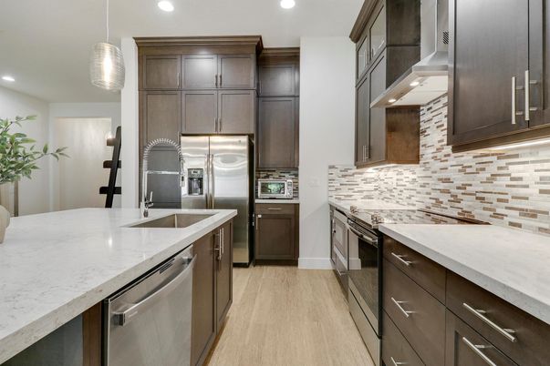 Interior, Kitchen, Pendant Lights, Recessed Lighting, Stainless Steel Appliances, Wood Texture Flooring
