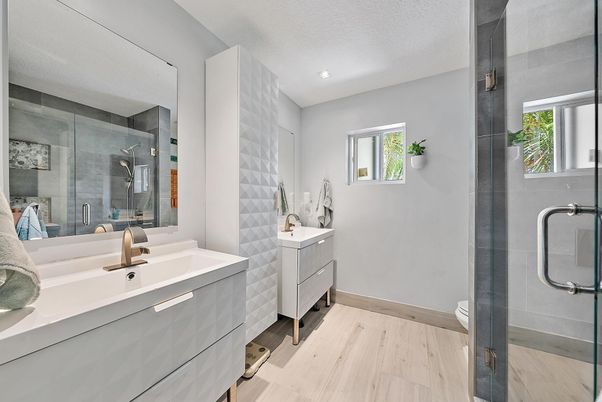 Bathroom, Dual Sink Vanities, Glass Shower, Interior, Recessed Lighting, Wood Texture Flooring