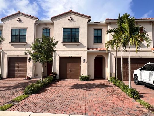 Attached, Exterior, Facade, Spanish Mediterranean