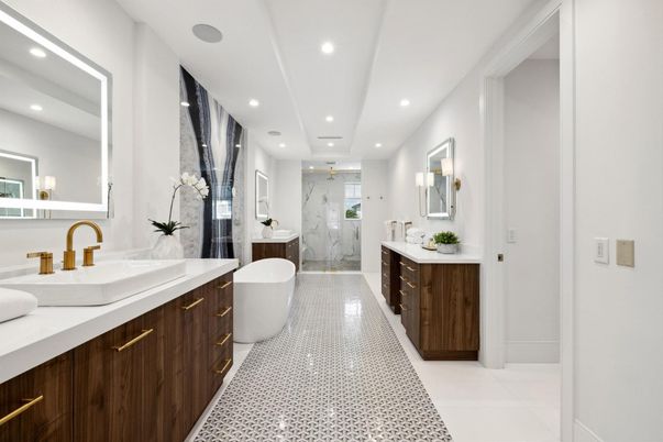 Bathroom, Dual Sink Vanities, Free Standing Baths, Glass Shower, Interior, Marble Walls, Recessed Lighting